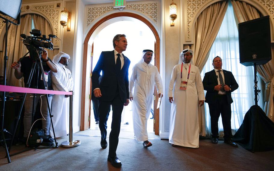 U.S. Secretary of State Antony Blinken, center left, arrives for a briefing in Doha, Qatar, on Tuesday, Nov. 22, 2022. 