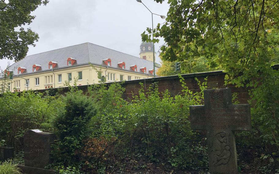 The U.S. Army Kleber Kaserne clock tower as seen from Hauptfriedhof, Kaiserslautern's main cemetery, on Oct. 2, 2022.