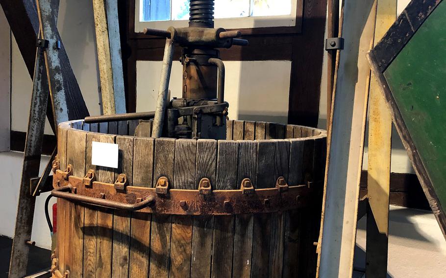 An old wine presser is among the artifacts at the Stuttgart Museum of Viniculture, which tells the history of local winemaking. 