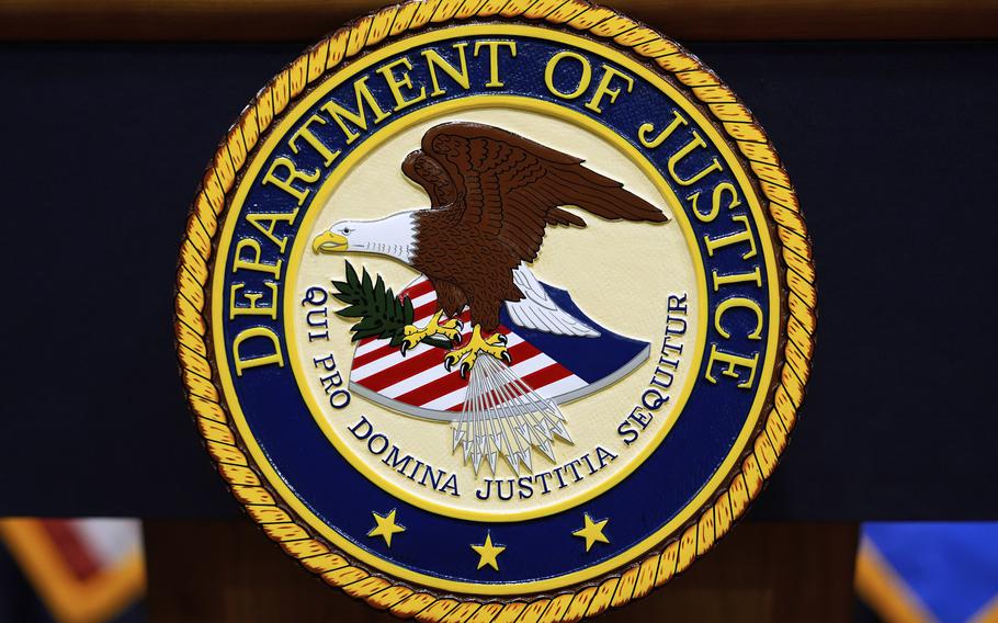 The Department of Justice logo.