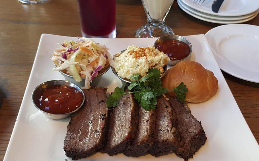 The black Wagyu brisket, served with two side dishes, at Midtown BBQ in Nagoya, Japan.