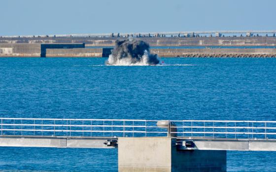The Japan Maritime Self-Defense Force blows up 315 World War II-era artillery shells, bullets and grenades offshore from Naha Port’s Shinko Wharf on Okinawa, Wednesday, Jan. 26, 2022. 