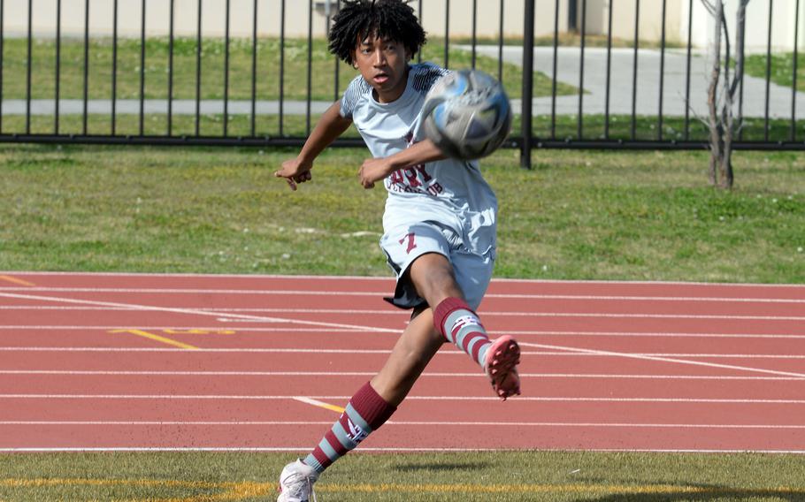 Keith Ewing send a corner kick toward the goal.