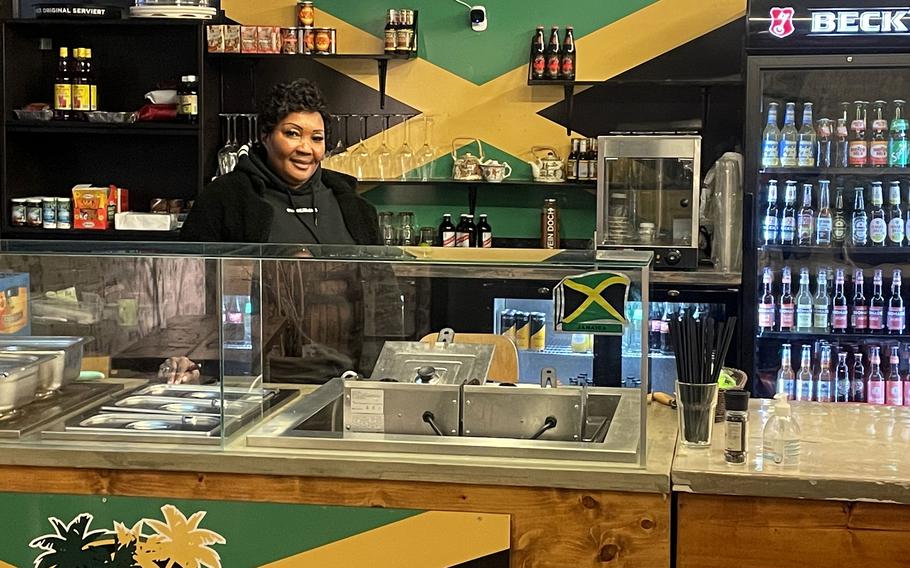 The owner of Bickles Jamaican Grill at her restaurant in Frankfurt, Germany, Jan. 15, 2022. 