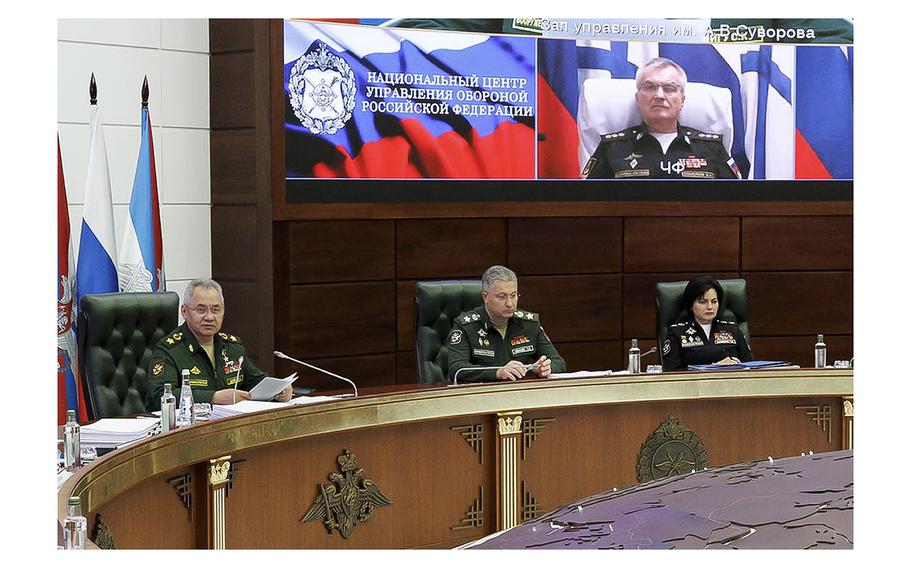 The monitor screen shows the Russian Black Sea Fleet's commander, Adm. Viktor Sokolov, top right, as he joins a meeting with Russian Defense Minister Sergei Shoigu and other top Russian officers in Moscow on Wednesday, Sept. 27, 2023.