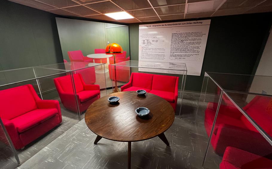 Magenta-colored chairs are the rare dot of color in the former German government bunker in Bad Neuenahr-Ahrweiler, Germany, Feb. 13, 2022. Most colors in the subterranean bunker system range from beige to green and were thought to calm anxious government officials during a nuclear emergency.