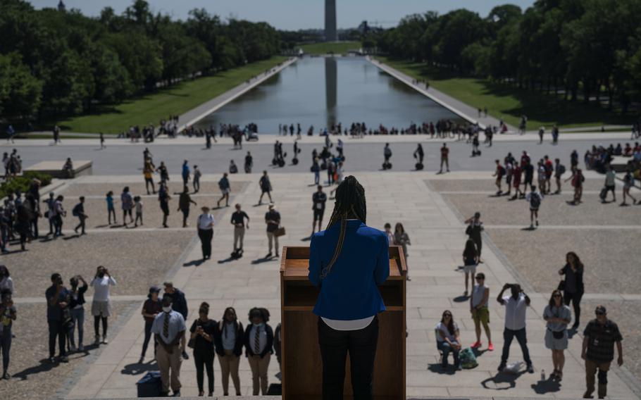 D.C. and Prince George's County Public School students, including Emory Springs, 12, left, of Benjamin Tasker Middle School, gave speeches at the Lincoln Memorial, which this year celebrates its 100th anniversary, on May 18, 2022, in Washington, D.C. 