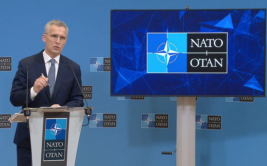 NATO Secretary-General Jens Stoltenberg talks to reporters in Brussels, March 15, 2022, a day before a meeting of defense ministers at the organization's headquarters.