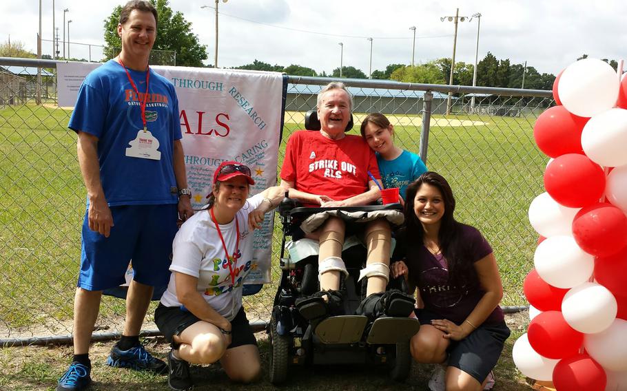 Darrell Lee, 72, center, was diagnosed with amyotrophic lateral sclerosis (ALS) in 2009. For the past several years, the Winter Garden resident has been cared for with the help of the James A. Haley Veterans’ Hospital in Tampa, his daughter Ashley Lee, right, and his granddaughter, Kaylei Lee, second from right. 