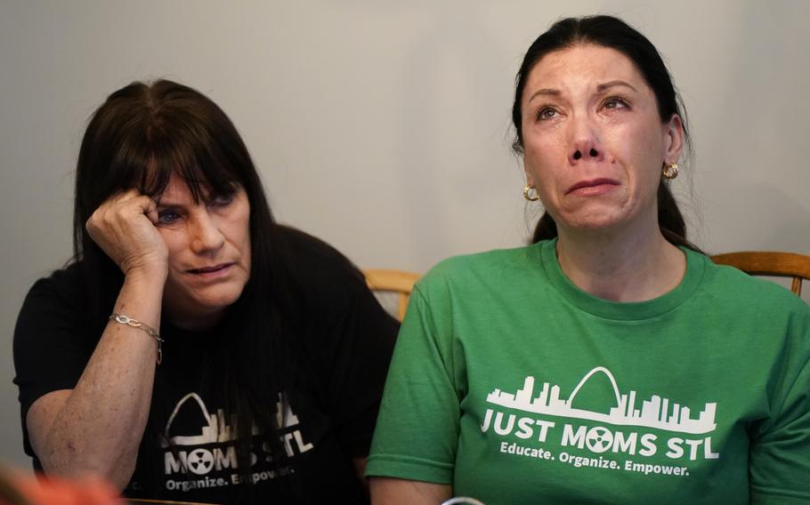 Karen Nickel, left, and Dawn Chapman, co-founders of Just Moms STL, a group created to bring attention to nuclear contamination found in the metropolitan area, pause while sharing stories Friday, April 7, 2023, in Maryland Heights, Mo.