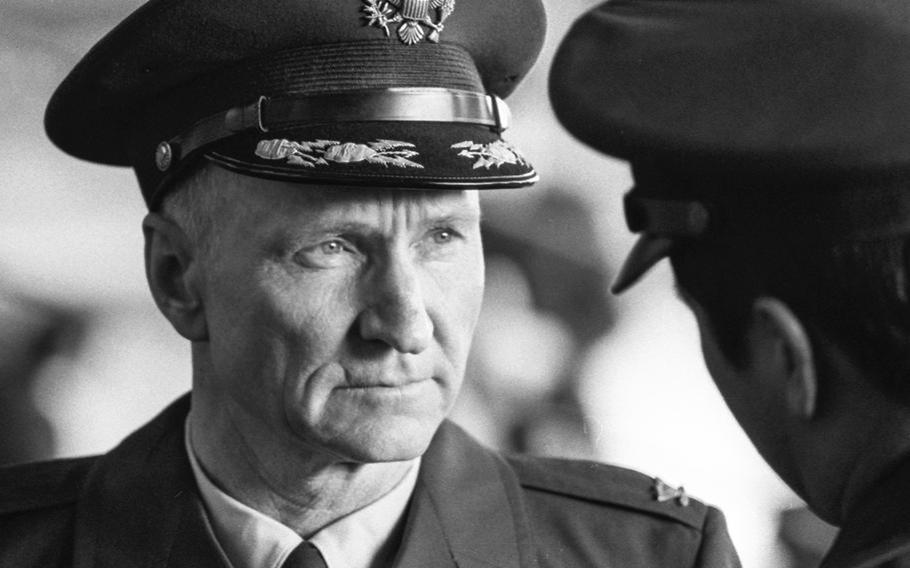 Col. Gail Halvorsen, the famed "Candy Bomber" of the Berlin Airlift, talks with a fellow officer at Tempelhof Airport in Berlin in February 1974, as he prepares to leave the city for his next assignment in Utah.