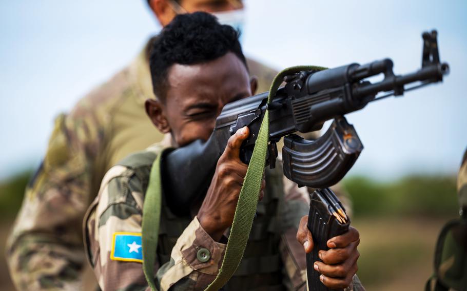 A member of the Somalian Danab Brigade aims his weapon during a range day hosted by U.S. forces in the east African country in May 2021. The U.S. has since withdrawn its forces from the country.