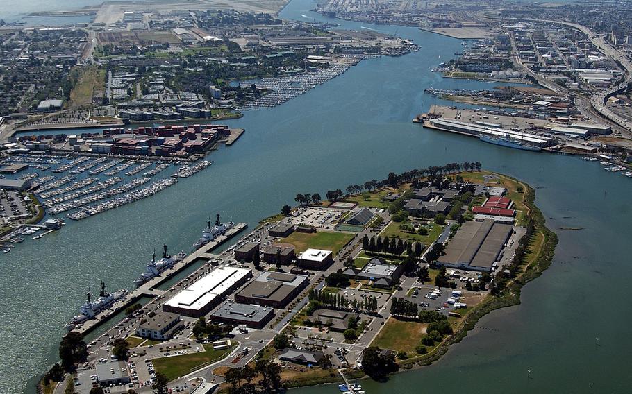 U.S. Coast Guard Base Alameda as seen in 2003, with Oakland and San Francisco in the background. Property management company FPI Management Inc., recently was accused of illegally charging members of the Coast Guard here for breaking their lease due to military orders.