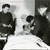 Hed: First light, first sight, 1954

After groping through 12 years of darkness, a little Korean boy, Lee Toi Byun, was given his sight recently after an operation performed by Maj. G. Peter Halberg a New York eye specialist at the 121st Evac. Hosp. near Seoul. Shown examining the boy after one cataract was successfully removed are (left to right) 1st Lt. Phyllis Duke, Lee, Col. William L. Spaulding, hospital commander, and Halberg.

 Col. William L. Spaulding, commanding officer of the 121st Evacuation Hospital and Eight Army consulting ophthalmologist, examines the eye of 12-year-old Lee Toi Byun. Lee just had cataract removed from his right eye by Maj. G. Peter Halberg (right), an eye specialist at the 121st. Halberg found Lee in a Korean clinic and brought him to the evacuation hospital where adequate facilities for the cataract surgery are available. Surgery on the left eye will follow soon. 

Looking for Stars and Stripes’ historic coverage? Subscribe to Stars and Stripes’ historic newspaper archive! We have digitized our 1948-1999 European and Pacific editions, as well as several of our WWII editions and made them available online through https://starsandstripes.newspaperarchive.com/

META TAGS: Pacific; South Korea; military medical; Korean; child; boy; hospital; bed; Evacuation Hospital; nurse; doctor; medical examination; sight; blind; blindness