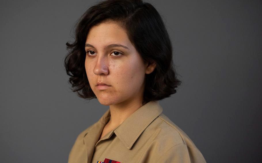 Lance Cpl. Catherine Arnett poses at Marine Corps Air Station Iwakuni, Japan, Aug. 22, 2022. 