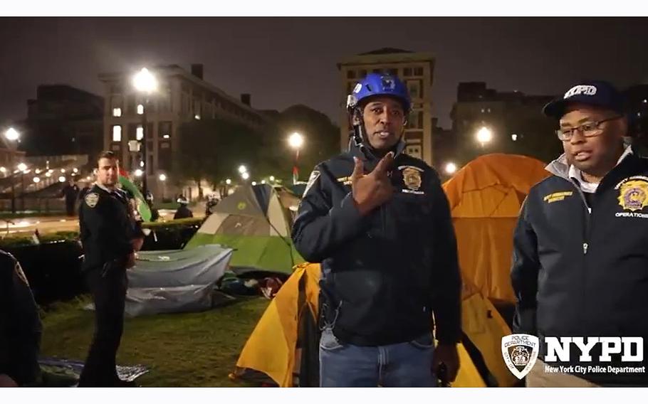 A video screen grab shows members of the New York Police Department after clearing out protesters and securing the campus at Columbia University.