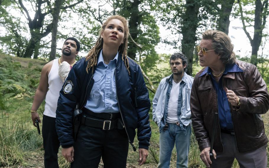 From left, O’Shea Jackson, Jr., Ayoola Smart, Alden Ehrenreich and Ray Liotta in a scene from “Cocaine Bear.” The role was one of Liotta’s last before he died in May.