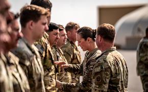 Paratroopers assigned to the Army's 82nd Airborne Division receive combat patches at Camp Buehring, Kuwait, Feb. 28, 2024. Soldiers deployed to select countries in the U.S. Central Command and U.S. Africa Command areas of responsibility between Oct. 7, 2023, and June 24, 2025, are now authorized to wear the patch.