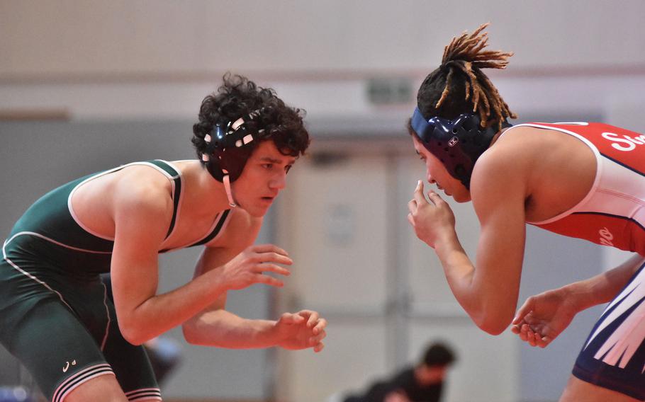 Naples' Kyson Fromm and Aviano's Javan Sherrod get set to square off at 157 pounds Saturday, Jan. 14, 2023, at Aviano, Italy. Fromm won by decision.

Kent Harris/Stars and Stripes