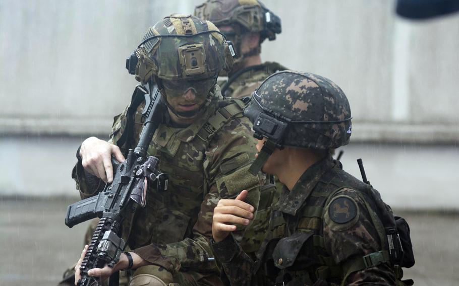 U.S. and South Korean soldiers plan their next move during urban warfare training in Paju, about eight miles from the border with North Korea, Wednesday, Aug. 23, 2023. 