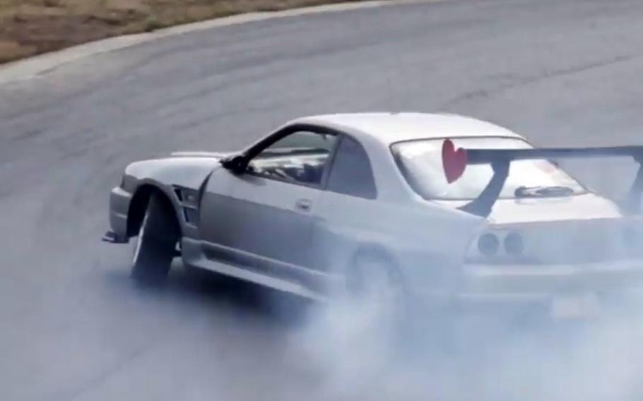 Army Sgt. Michael Dumpson drifts in his R33 Skyline at Yanbaru Circuit on Okinawa’s northeastern coast, in this undated photo.