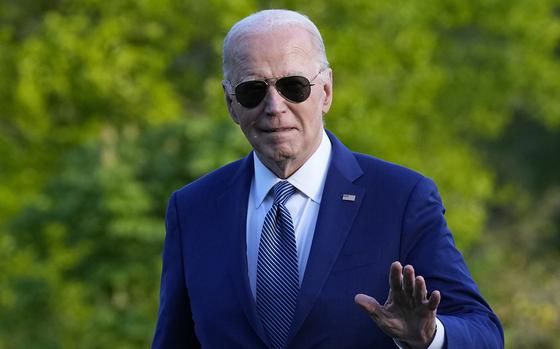 President Joe Biden waves as he walks across the South Lawn of the White House in Washington, on Tuesday, April 23, 2024.