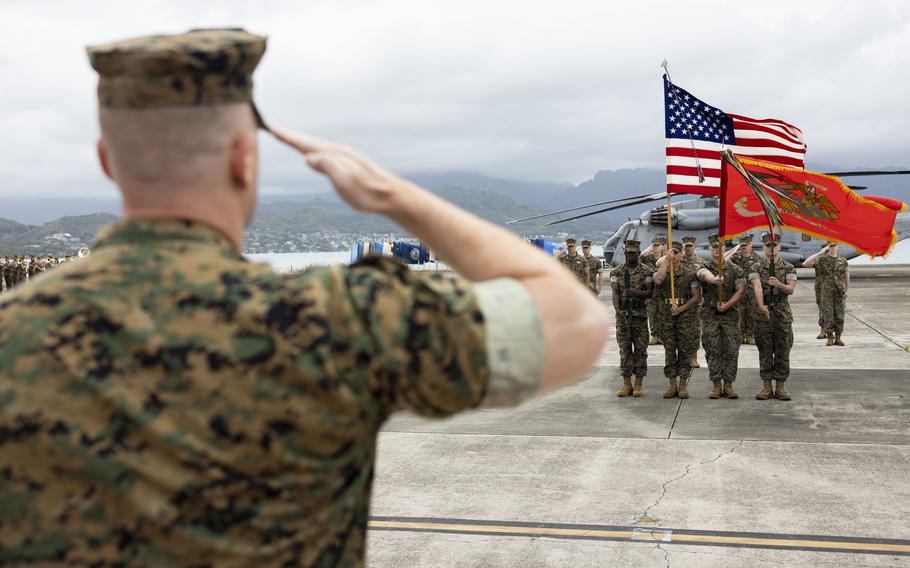 Lt. Col. Kelly Allen, commander of Marine Heavy Helicopter Squadron 463, salutes during the unit’s deactivation ceremony at Marine Corps Air Station Kaneohe Bay, Hawaii, Thursday, April 21, 2022. 
