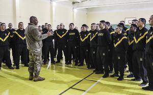 Command Sgt. Maj. John Sampa speaks with 278th Armored Cavalry Regiment Soldiers attending Basic Leadership Course (BLC) while visiting in Yavoriv, Ukraine, Jan. 25.