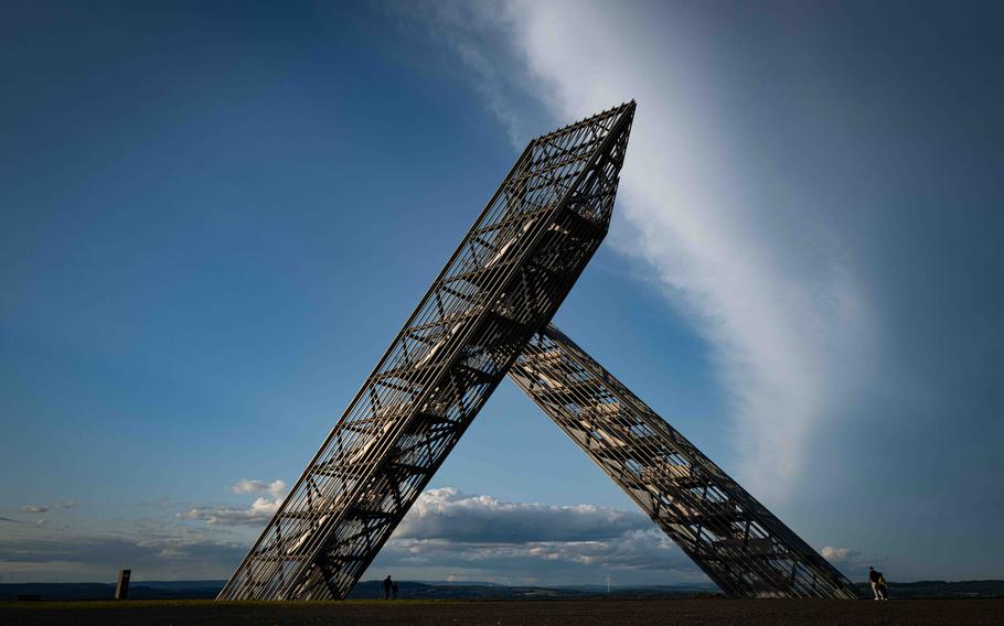 Visitors enter the Saar Polygon on Aug. 27, 2023, in Ensdorf, Germany. Each staircase is tilted at a 45-degree angle.