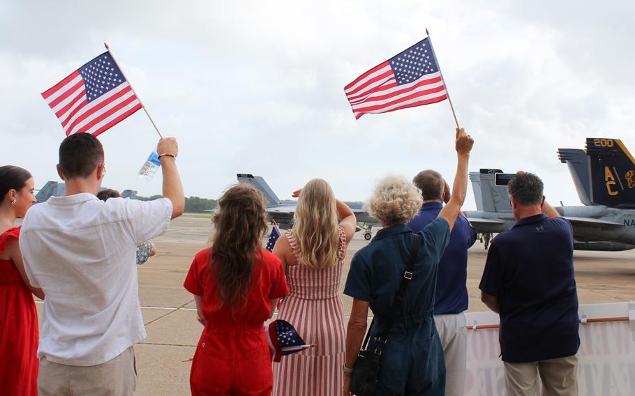 Dozens of family members gathered Friday, July 12, 2024, at Naval Air Station Oceana, Va., to welcome home four Virginia Beach-based fighter jet squadrons. 
