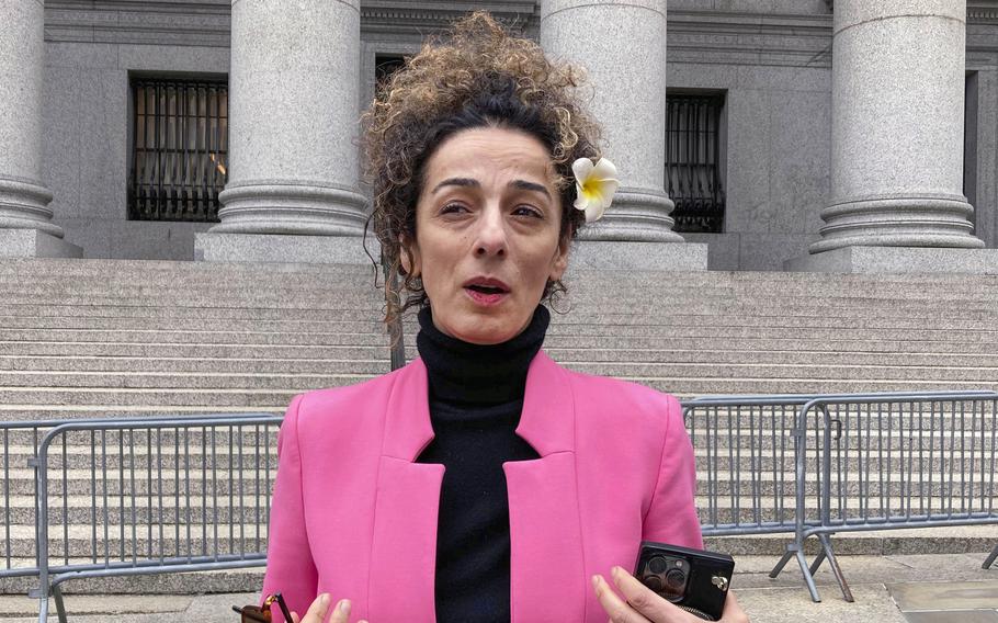 Masih Alinejad is interviewed outside Manhattan federal court, April 7, 2023, in New York. American officials say foreign countries like Iran and China intimidate, harass and sometimes plot violence against political opponents and activists in the U.S. “We’re not living in fear, we’re not living in paranoia, but the reality is very clear — that the Islamic Republic wants us dead, and we have to look over our shoulder every day,” the Iranian journalist said.