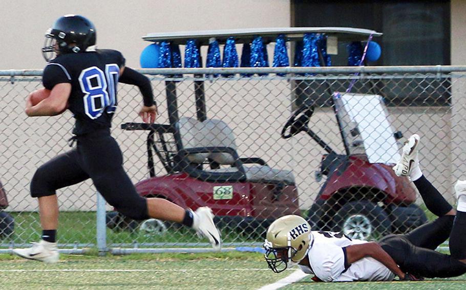 Osan's A.J. Panboon leaves a Humphreys player in his wake as he returns a kickoff 77 yards for a touchdown.