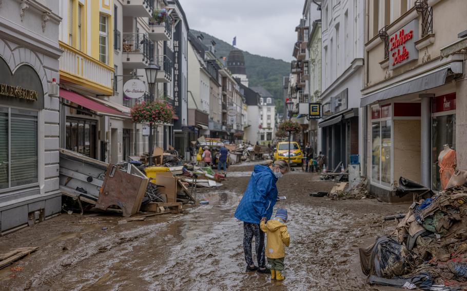 People walk through the flood damaged city center of Bad Neuenahr, Germany on July 16, 2021. 