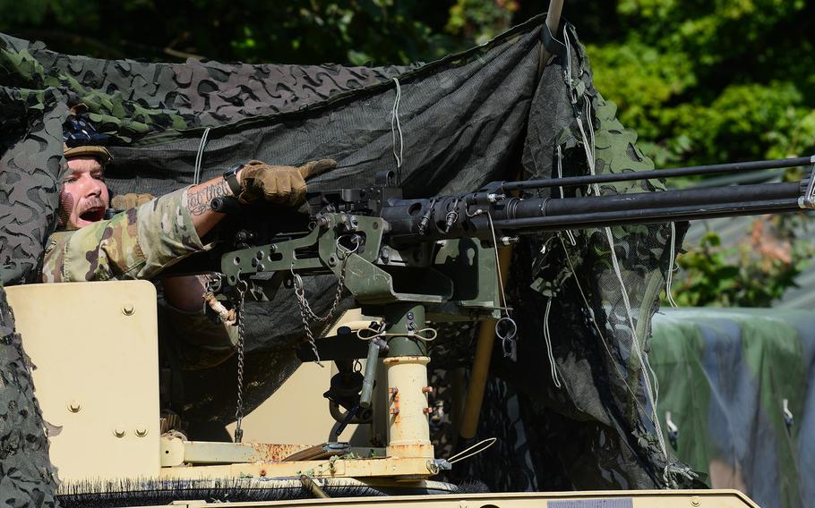 A Security Force Assistance Brigade soldier — known as an “advisor” — mans a .50-caliber machine gun during a pre-deployment training exercise Aug. 23, 2023, at Muscatatuck Training Center in Indiana. 