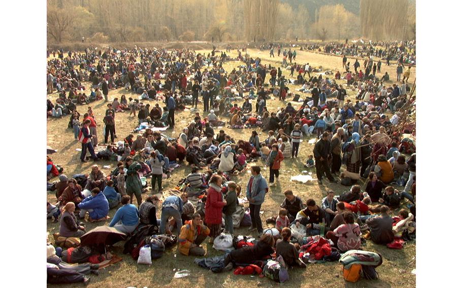 Refugees — forced onto trains in Pristinia, provincial capital of Kosovo — at a border crossing in Blace, Macedonia, on April 1, 1999. The Macedonian government estimated that at least 40,000 refugees had entered the country since airstrikes began over Yugoslavia. 