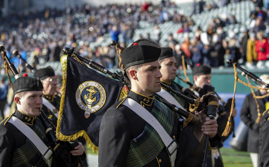 A brigade of Navy bagpipers parade across Philadelphia’s Lincoln Financial Field prior to the start of the annual Army-Navy game on Saturday, Dec. 10, 2022.