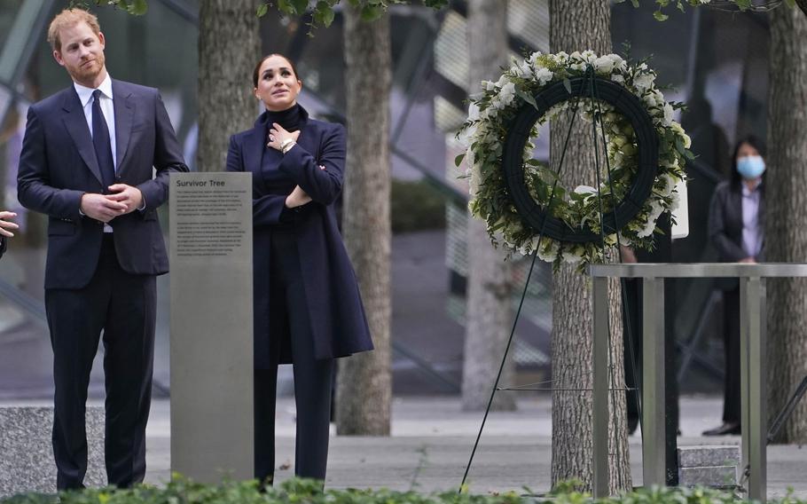  Prince Harry and Meghan Markle pause while getting a tour of the National September 11 Memorial & Museum in New York, on Thursday, Sept. 23, 2021. 