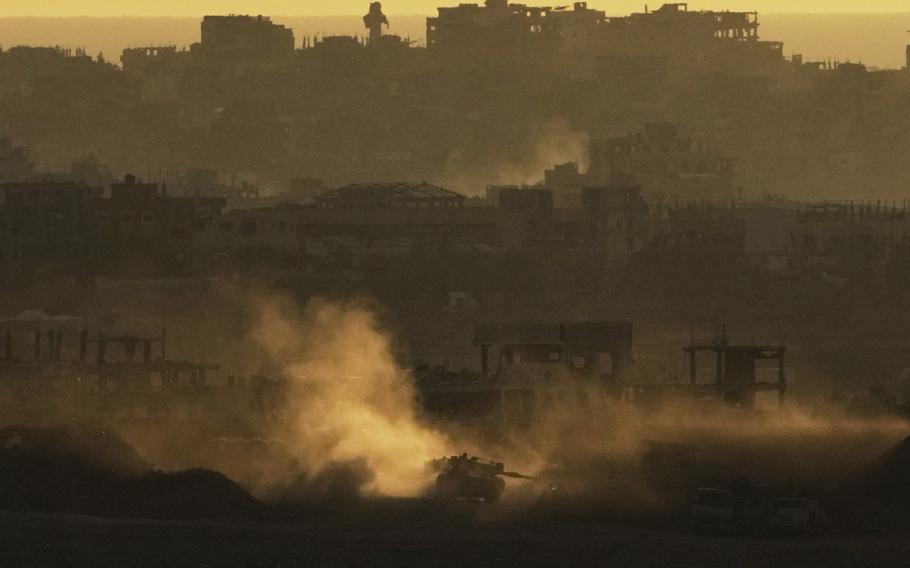 An Israeli army tank moves in the Gaza Strip.