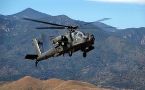 This AH-64 Apache helicopter used during a 2011 training exercise is a model similar to one that crashed at Fort Carson, Colo., on March 27, 2024. Two soldiers were hospitalized with minor injuries in the Colorado crash, which is the second Apache incident this week.