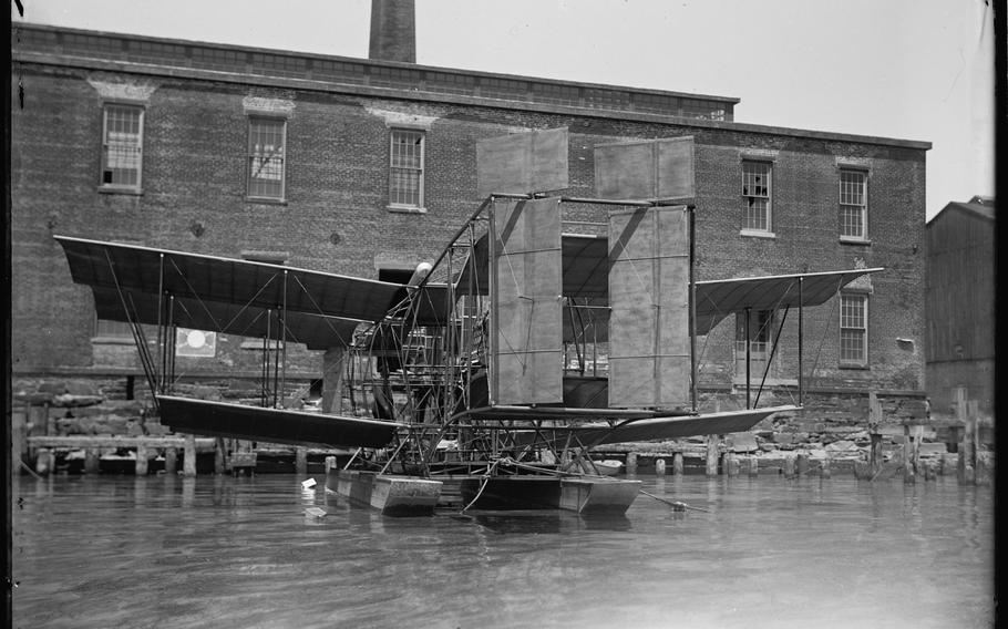 Samuel Pierpont Langley, secretary of the Smithsonian Institution, with an experimental biplane on the Potomac, c. 1917. 