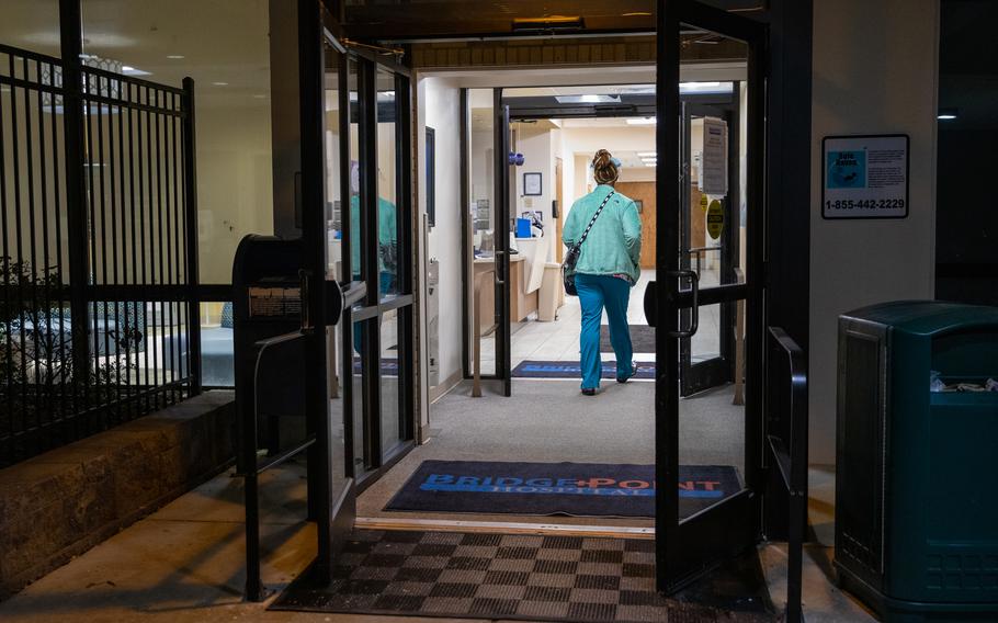 LaToya Francis walks into a Bridgepoint Healthcare facility in Southwest Washington on Jan. 14 to begin her shift. 