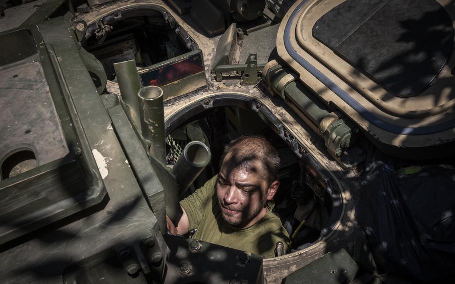 A 47th Brigade soldier works on a Bradley Fighting Vehicle.