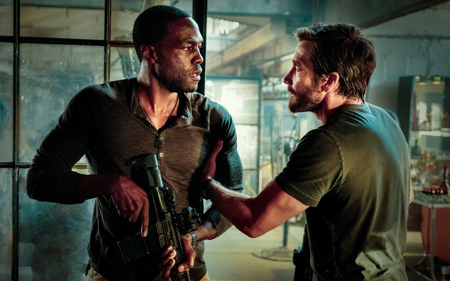 Yahya Abdul-Mateen II, left, and Jake Gyllenhaal star in “Ambulance,” now playing in select AAFES theaters.  