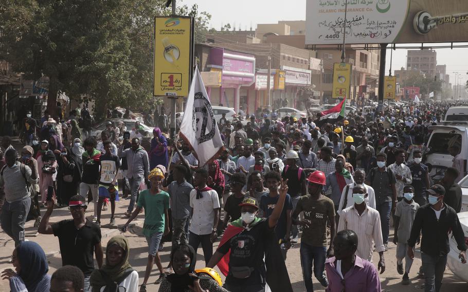 People gather during a protest in Khartoum, Sudan, Thursday, Jan. 13, 2022. 