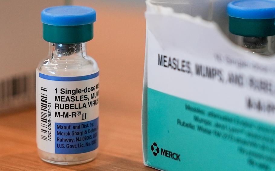 A vial of the measles, mumps and rubella vaccine is on display