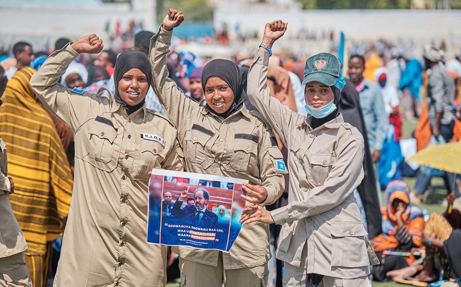 Somali Police officers hold a banner with a quote from Somalia’s President Hassan Sheikh Mohamud during a demonstration in support of Somalia’s government following the port deal signed between Ethiopia and the breakaway region of Somaliland at Eng Yariisow Stadium in Mogadishu on Jan. 3, 2024. Somalia vowed to defend its territory after a controversial Red Sea access deal between Ethiopia and the breakaway state of Somaliland that it branded as “aggression.”
