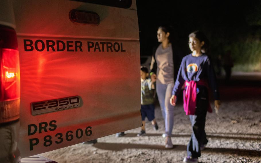 A group of Venezuelan immigrants is taken into U.S. Border Patrol custody on May 19, 2021, in Del Rio, Texas. The arrival of Venezuelans into the U.S. has increased over the last five years due to that country’s economic and political turmoil. 