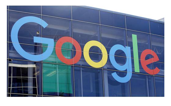 FILE -- A sign is shown on a Google building at their campus in Mountain View, Calif., on Sept. 24, 2019. On Friday, April 12, 2024, Google announced it was testing removing links to California news websites from some people's search results. The search giant said it was preparing in case the Legislature passed a bill requiring it to pay media companies a fee for linking to its content. (AP Photo/Jeff Chiu, File)