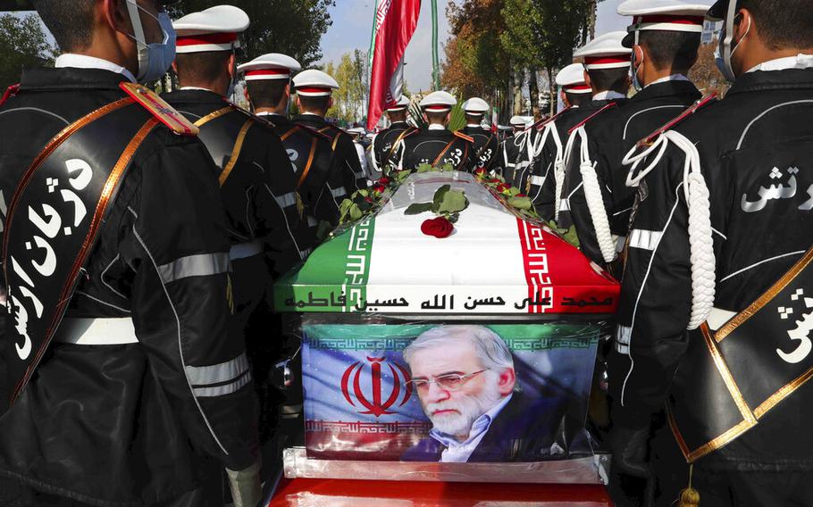 Military personnel take part in a funeral ceremony in Tehran, Iran, on Nov. 30, 2020, as they carry the flag-draped coffin of scientist Mohsen Fakhrizadeh. A court in Iran on Thursday, June 23, 2022 ordered the United States government to pay over $4 billion to the families of Iranian nuclear scientists who have been killed in targeted attacks in recent years.