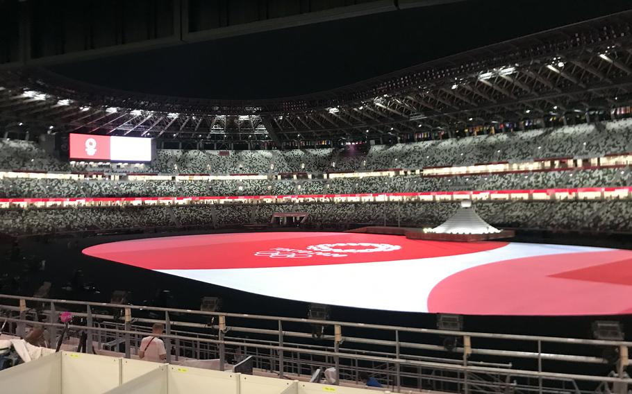 The opening ceremony for the pandemic-delayed Tokyo Olympics gets underway at a nearly empty National Stadium, Friday, June 23, 2021. 